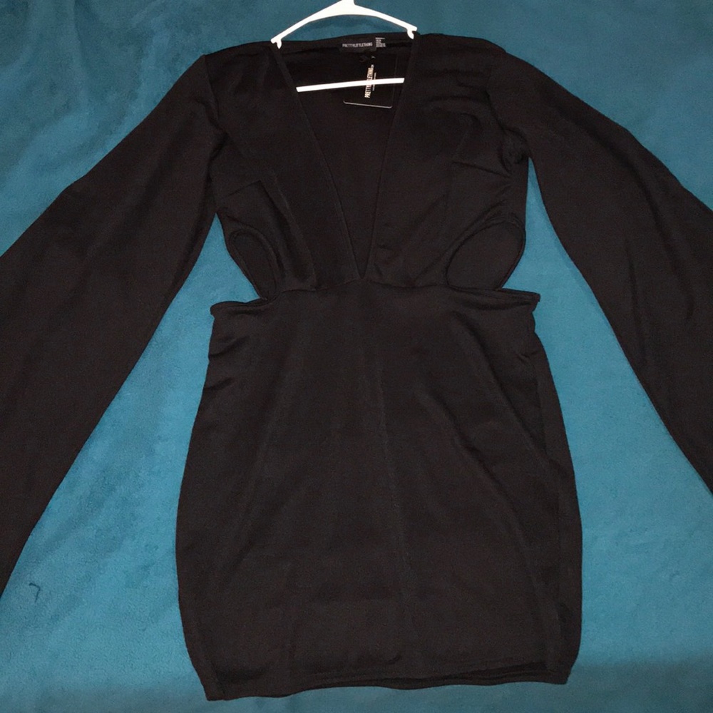 Black flared sleeve cut out dress